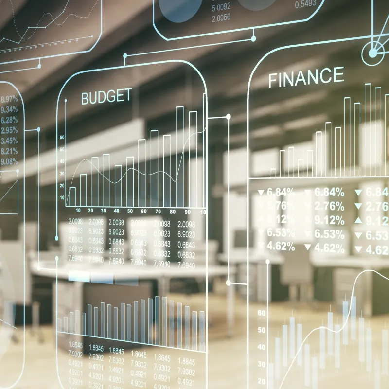 Transparente Finanzgrafiken vor moderner Büroumgebung. Transparente Finanzgrafiken vor moderner Büroumgebung.